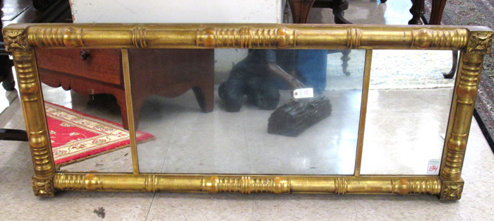 Appraisal: EMPIRE GILTWOOD OVERMANTEL MIRROR American th century the horizontal mirror