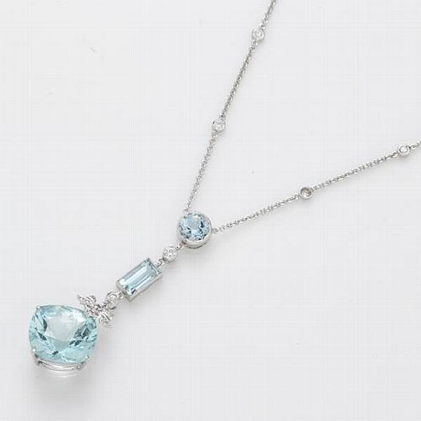 Appraisal: An aquamarine diamond and k white gold necklace estimated aquamarine