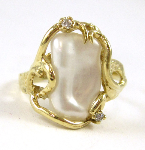 Appraisal: BAROQUE PEARL AND DIAMOND RING k yellow gold set with