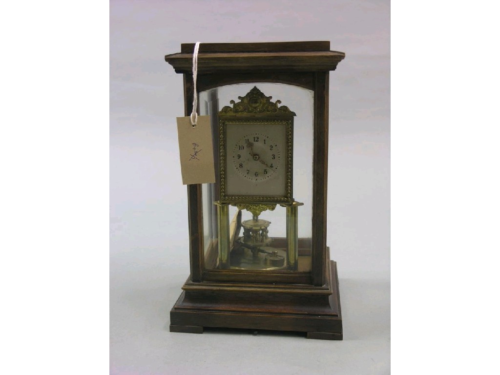 Appraisal: A walnut cased four-glass mantel clock featuring square dial and