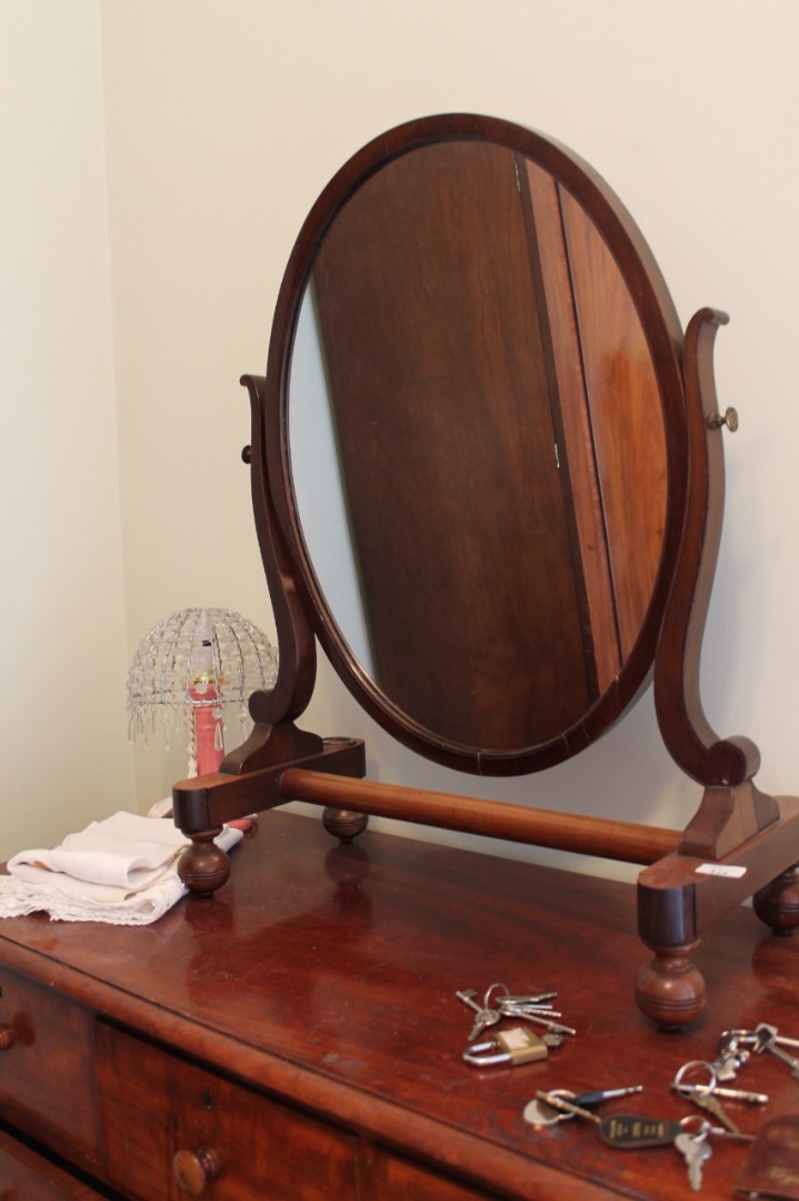 Appraisal: A Victorian mahogany dressing table mirror with oval plate scroll