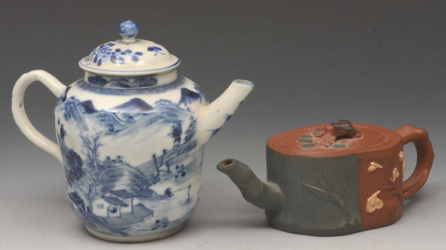 Appraisal: A YIXING SMALL TEAPOT with raised bamboo decoration and a