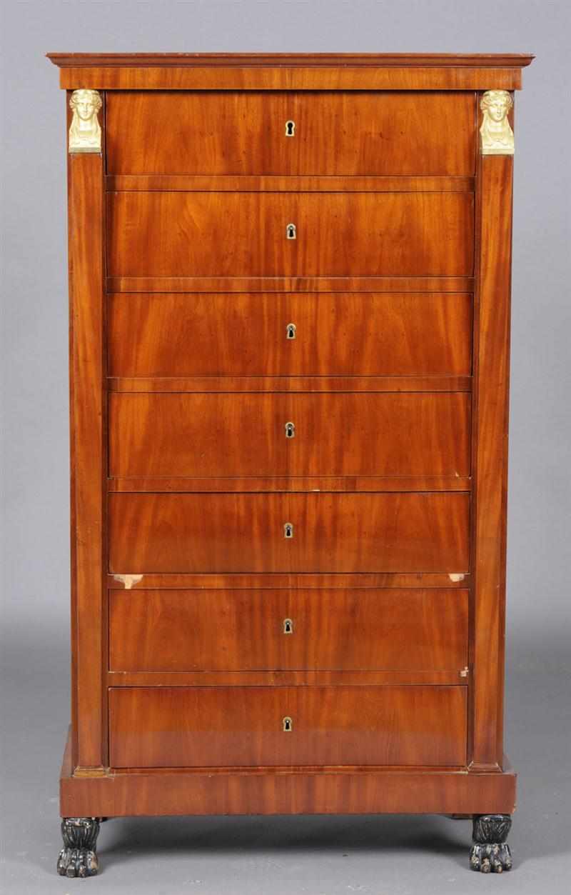 Appraisal: EMPIRE GILT-METAL MOUNTED MAHOGANY SEMAINIER Containing seven drawers flanked by