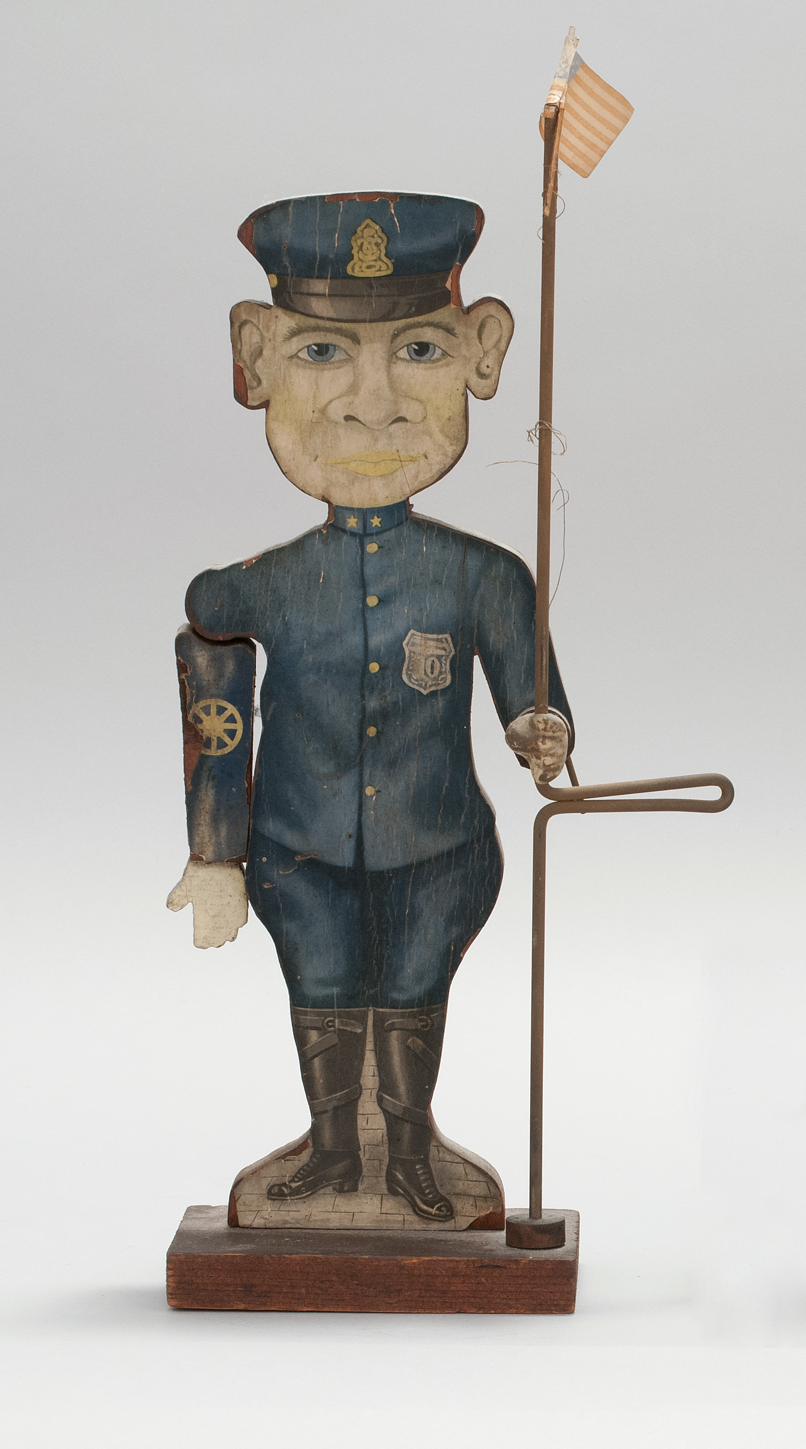 Appraisal: POLICEMAN FIGURE WOODEN LITHOGRAPHED TOY Circa Possibly made by Bliss