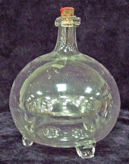 Appraisal: An th Century blown glass fly trap cm high