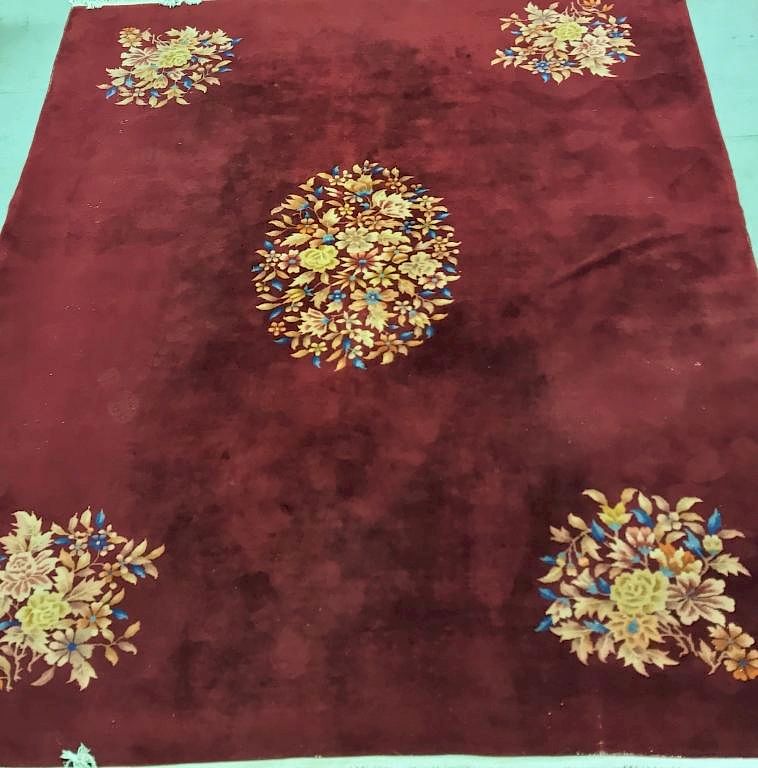 Appraisal: Room Size Burgundy Chinese Carpet Room size burgundy Chinese carpet