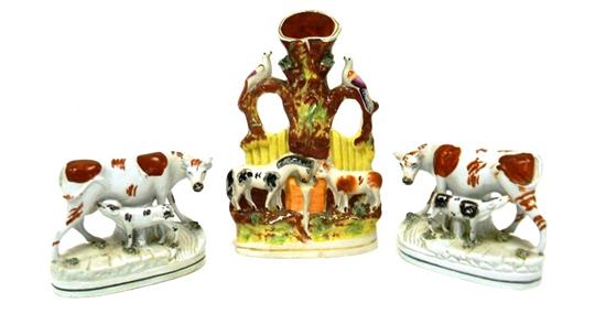 Appraisal: th C Staffordshire and spongeware three pieces multifigural group featuring