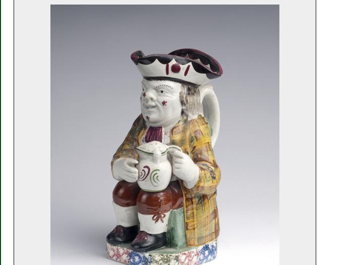 Appraisal: RARE NEALE PEARLWARE TOBY JUG DATED Wearing a maroon-sprigged waistcoat