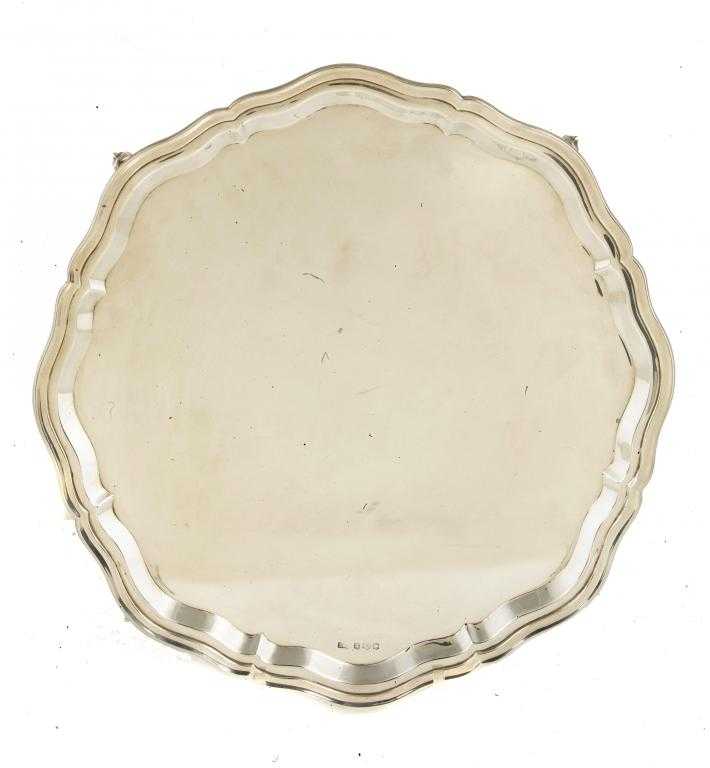 Appraisal: AN ELIZABETH II SALVER the plain field in moulded border