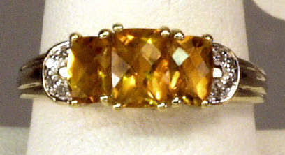 Appraisal: Ladies karat yellow gold nice color three stone checkerboard cut