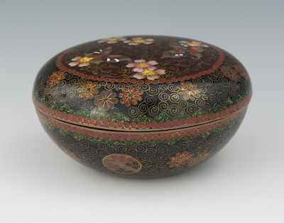 Appraisal: A Low Round Cloisonne Lidded Trinket Box The squat rounded