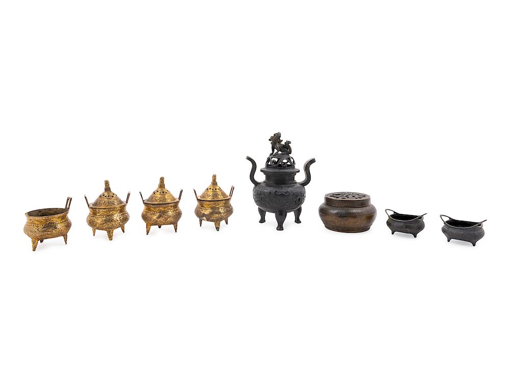 Appraisal: Seven Chinese Metal Incense Burners and One Bronze Circular Hand