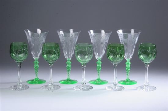 Appraisal: GREEN AND CLEAR GLASS WINE GOBLETS Comprising eight with etched