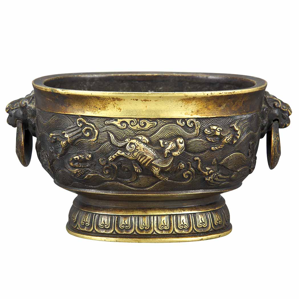 Appraisal: Chinese Bronze Censer th Century Worked in relief with leaping