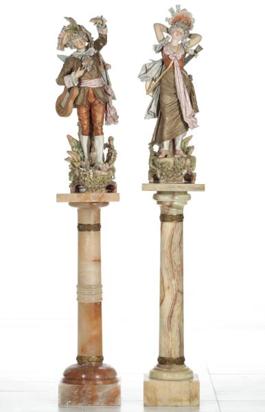 Appraisal: ROYAL DUX FIGURES ON ONYX AND ALABASTER PEDESTALSThis estate lot