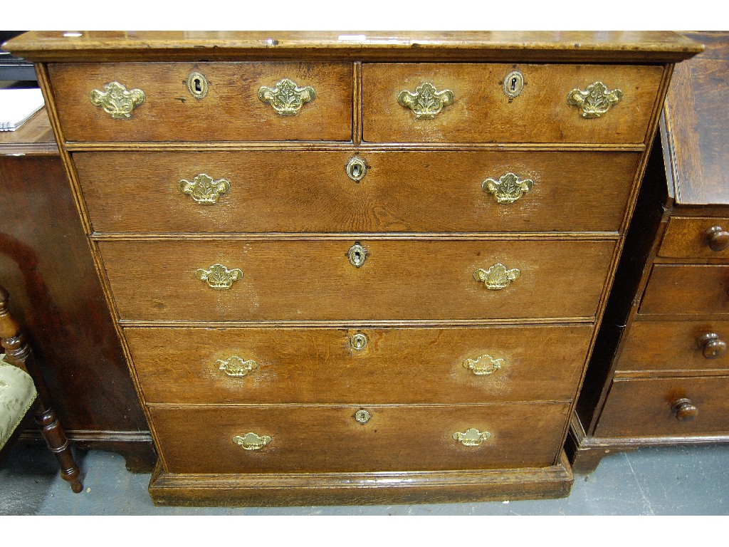 Appraisal: A late th century oak chest of two short over