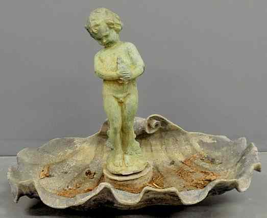 Appraisal: Lead garden fountain th c with a faux bronze cherub