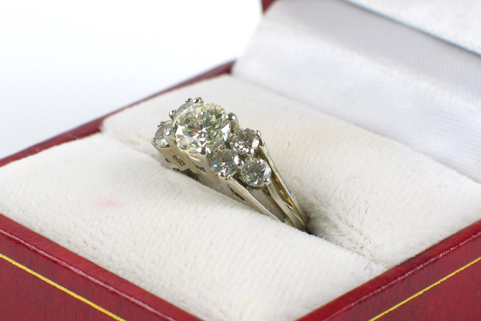 Appraisal: DIAMOND AND NINETEEN KARAT WHITE GOLD RING centering a single