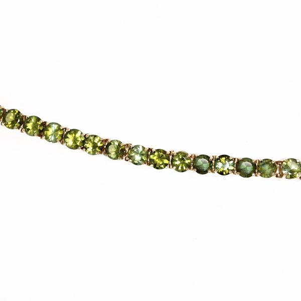 Appraisal: PERIDOT TENNIS BRACELET k yg prong setting gs GW