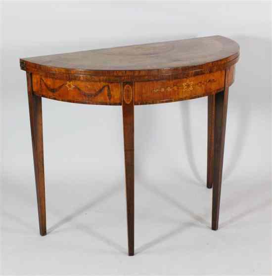 Appraisal: A George III inlaid satinwood demi-lune card table on tapered