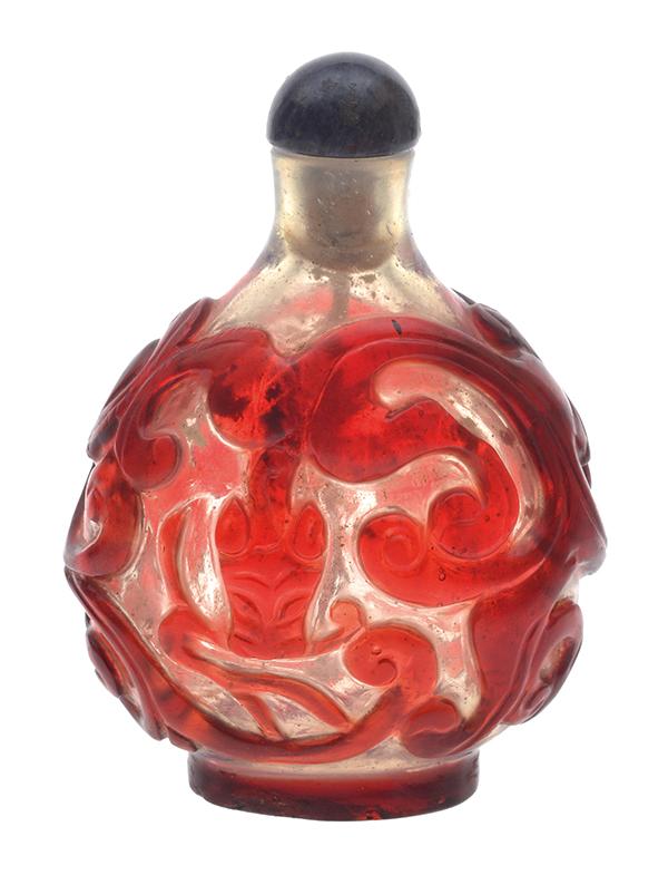 Appraisal: A RED GLASS OVERLAY SNUFF BOTTLE WITH SODALITE STOPPER