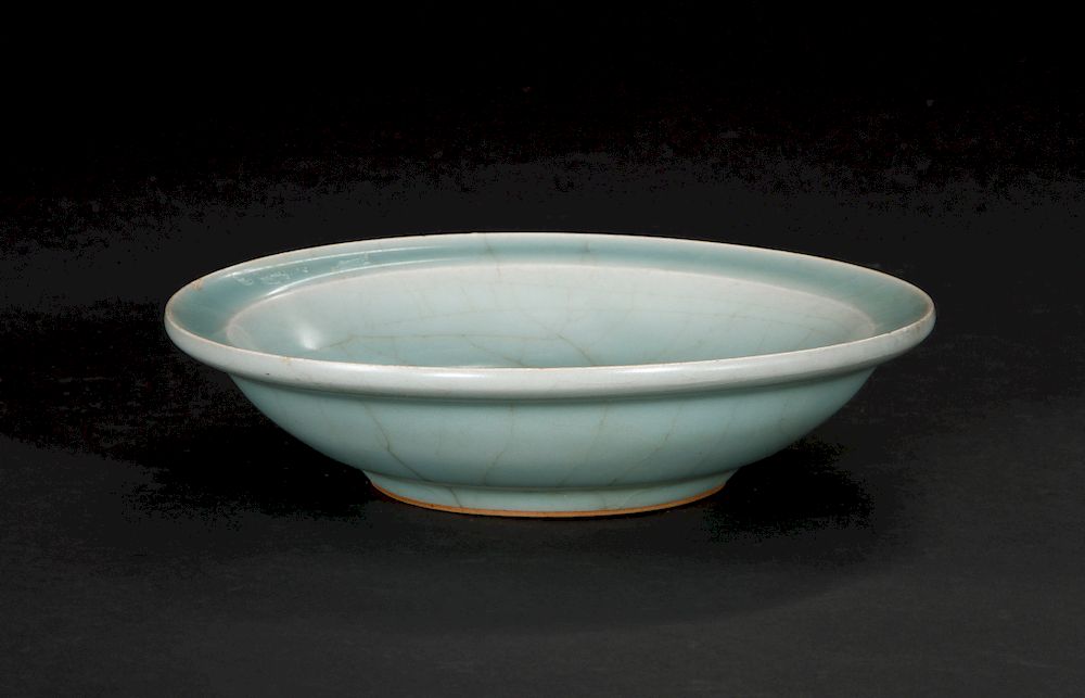 Appraisal: Guan-Type Lungchuan Celadon Dish Finely potted with rounded sides rising