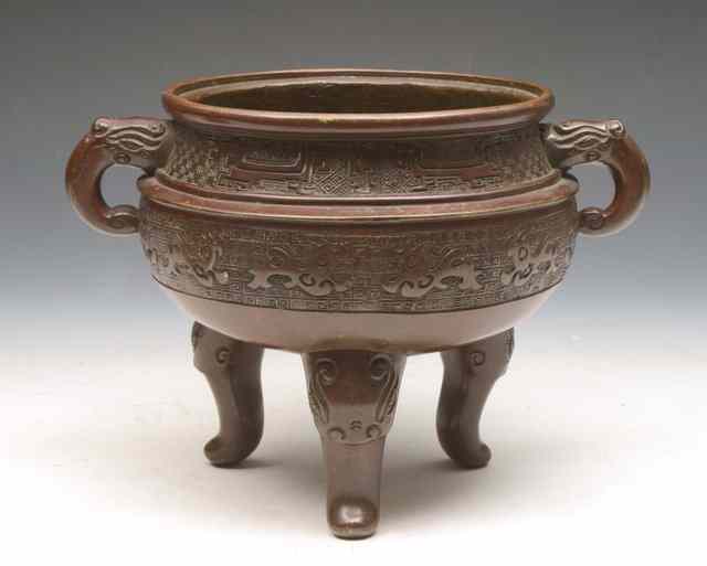 Appraisal: A CHINESE BRONZE CENSER of archaic form th Century