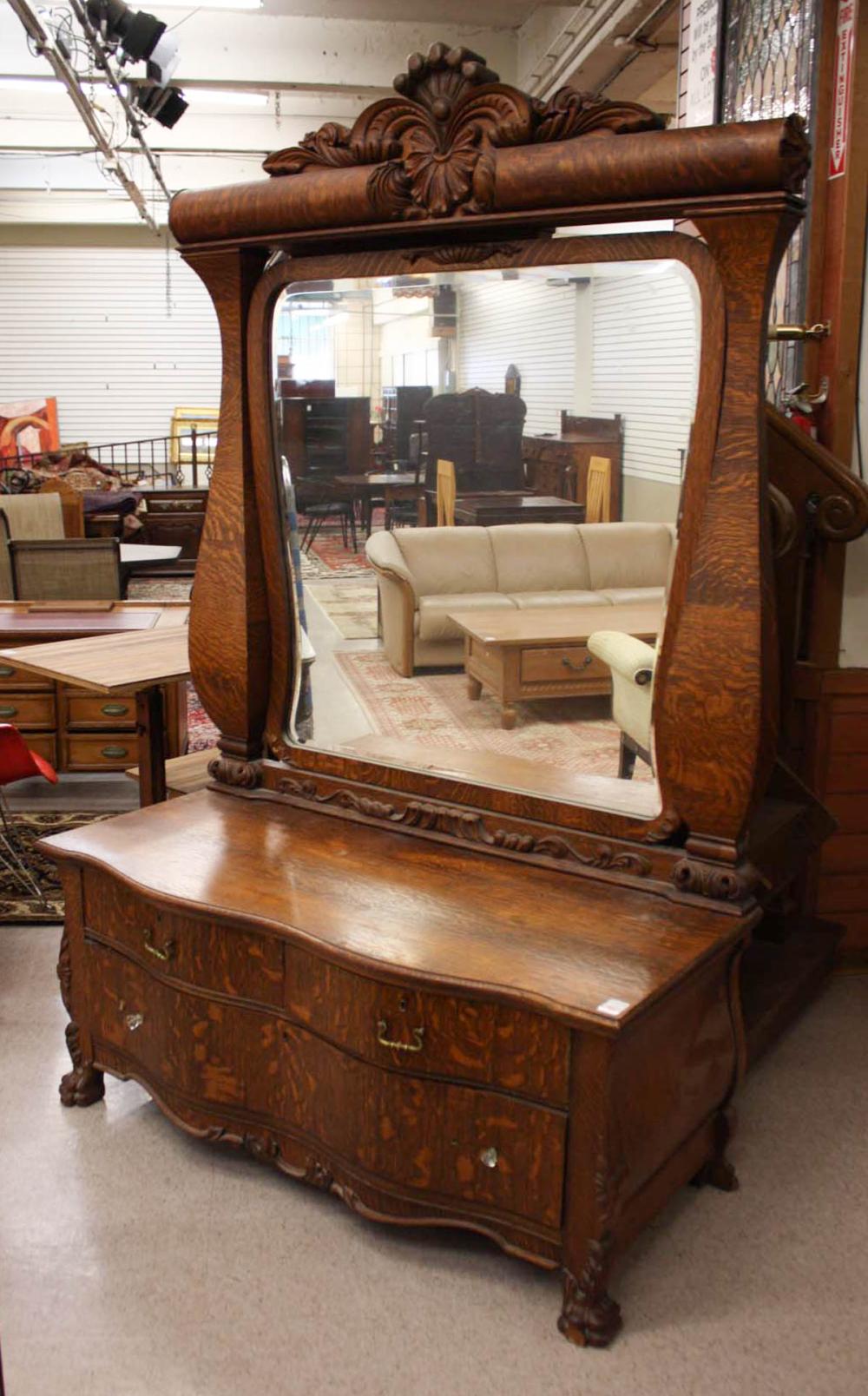 Appraisal: VICTORIAN OAK LOW DRESSER WITH LARGE ATTACHED MIRROR American last