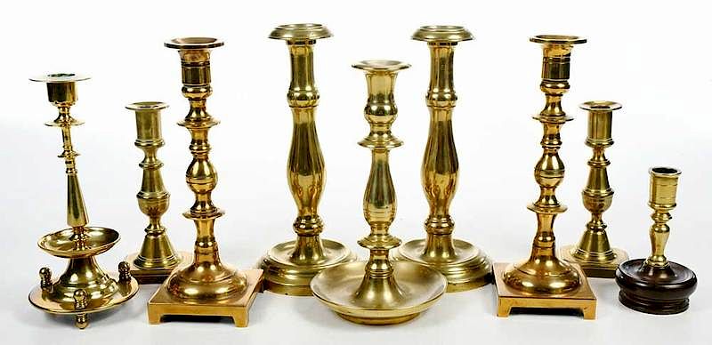 Appraisal: Nine Brass and Bell Metal Candlesticks th century comprising three