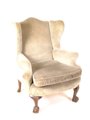 Appraisal: A Georgian style greenish blue upholstered wing armchair with rolled