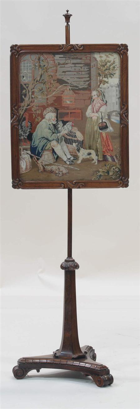 Appraisal: A Victorian pole screen the rectangular frame with a sewn