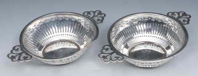 Appraisal: A PAIR OF SILVER BON-BON DISHES with pierced sides and