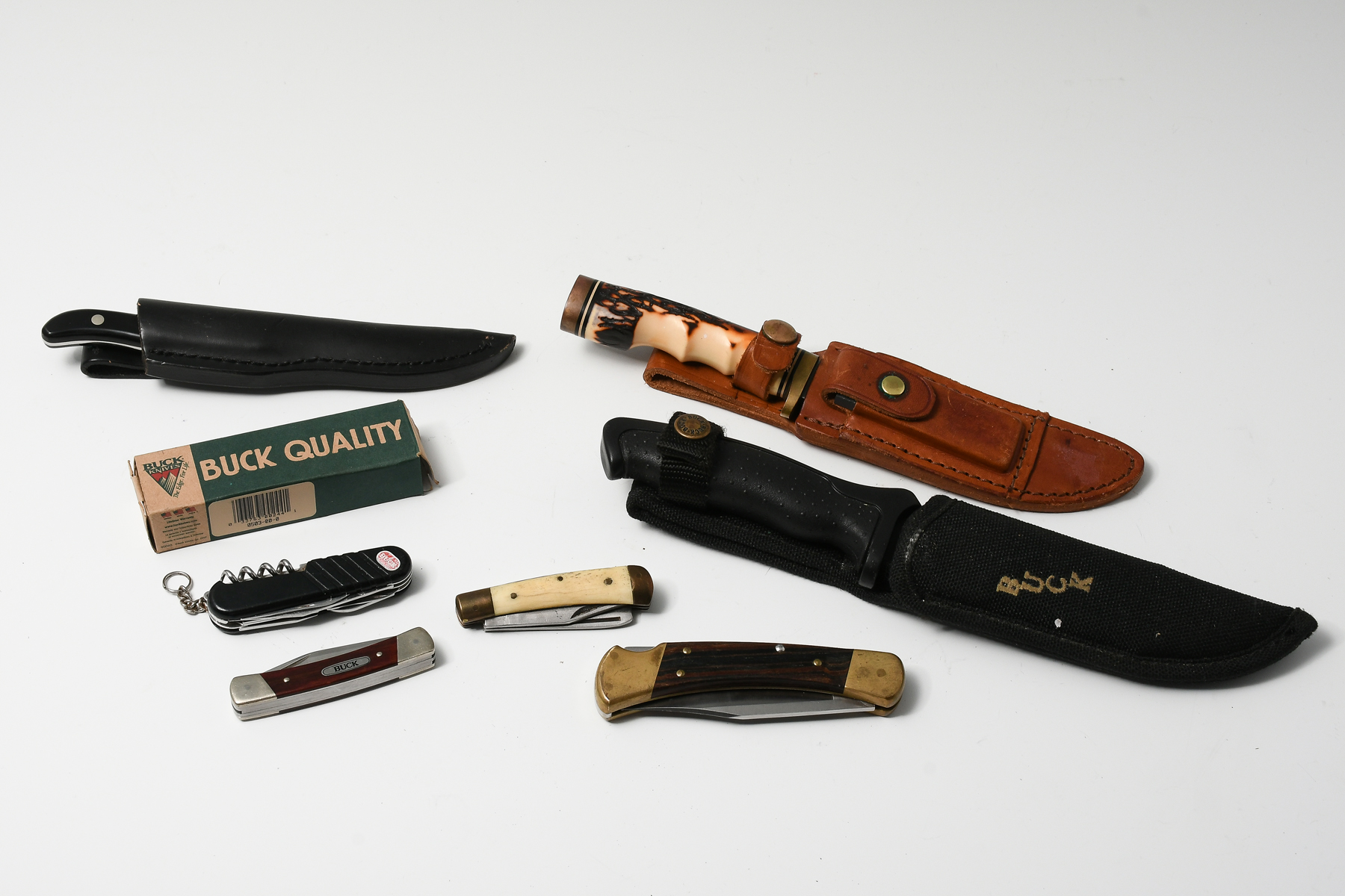 Appraisal: EIGHT-PIECE COLLECTIBLE KNIFE LOT To Include Buck fixed blade tactical