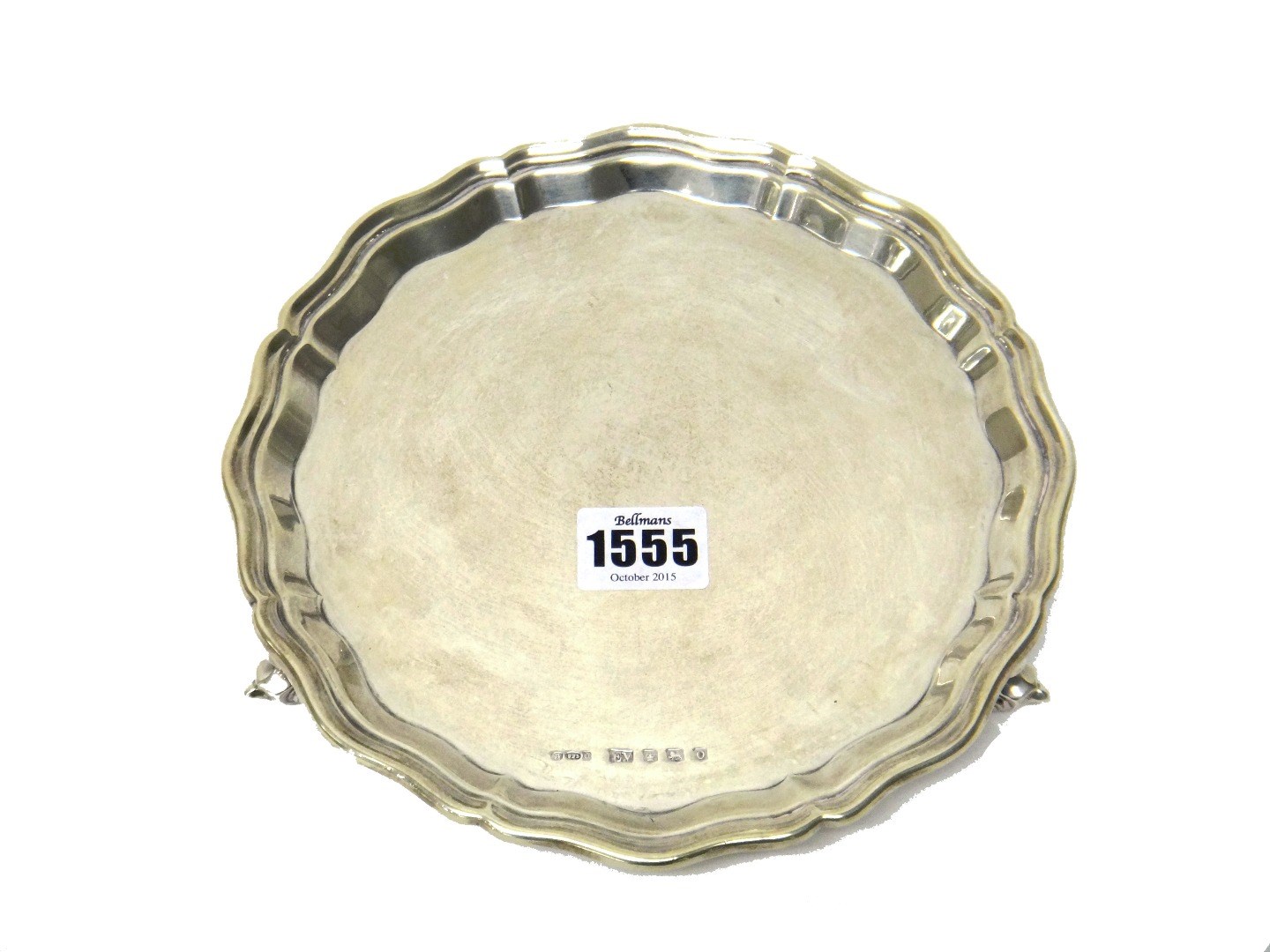 Appraisal: A silver salver of shaped circular form with a pie