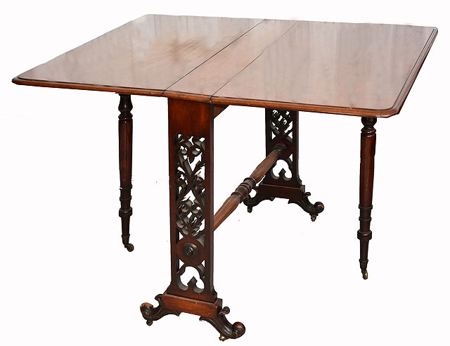 Appraisal: A VICTORIAN MAHOGANY DROP LEAF SUTHERLAND TABLE with carved end