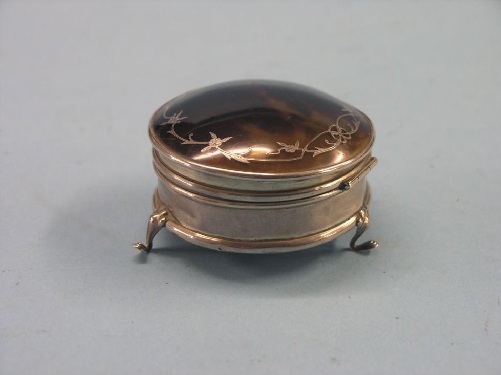 Appraisal: A silver and tortoiseshell box circular-shape with inlaid silver pique