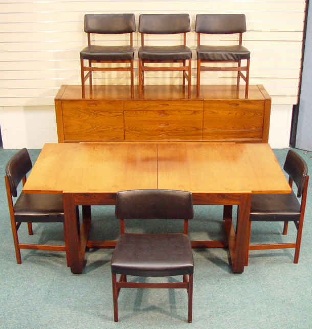 Appraisal: s rosewood dining suite comprising an extending rectangular dining table