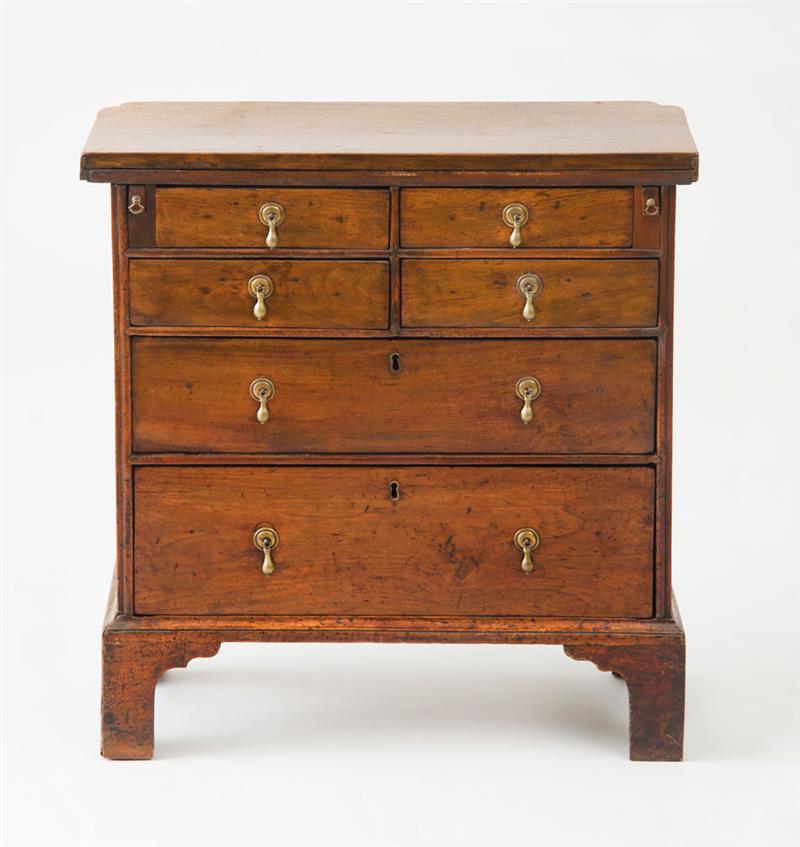 Appraisal: GEORGE I PROVINCIAL WALNUT BACHELOR'S CHEST OF DRAWERS Handles of