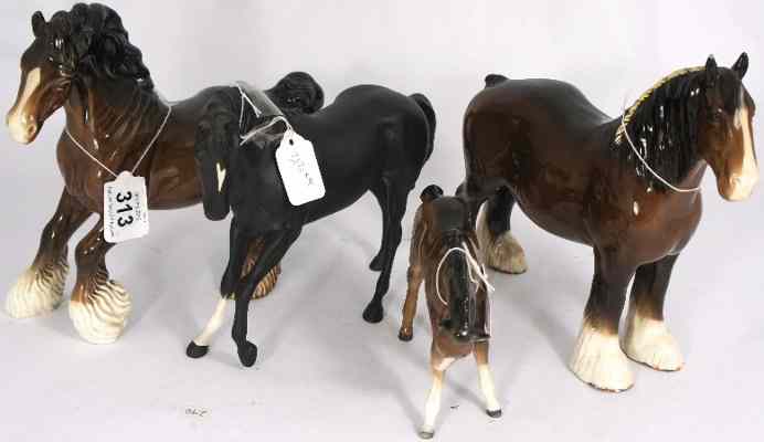 Appraisal: Beswick Foal Head Down Black Beauty Shire Mare and Cantering