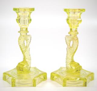 Appraisal: Pressed Dolphin candlesticks pair A pair of mid th century