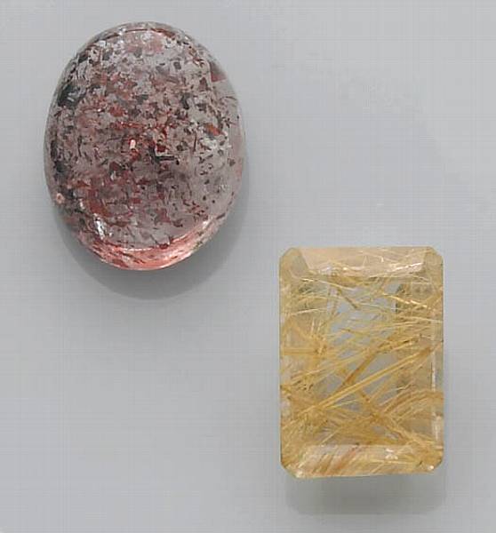 Appraisal: Rutilated Quartz and Hematitic Quartz An emerald-cut rutilated quartz from