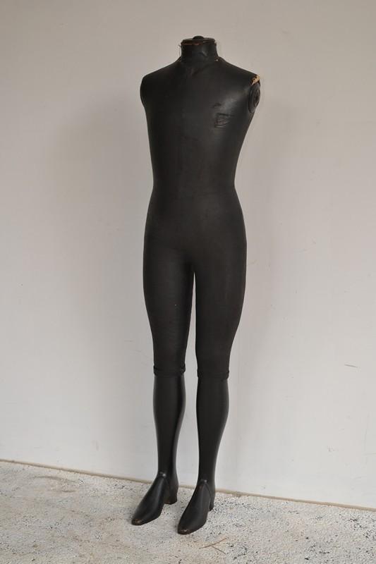 Appraisal: A FRENCH CHILD SIZE MANEQUIN IN BLACK FRENCH CHILD SIZE