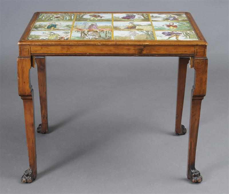 Appraisal: ENGLISH ARTS AND CRAFTS TILE-TOP WALNUT TABLE Incorporating twelve ceramic