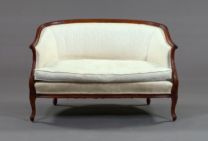 Appraisal: Louis XV-Style Fruitwood Settee the padded back and downswept arms