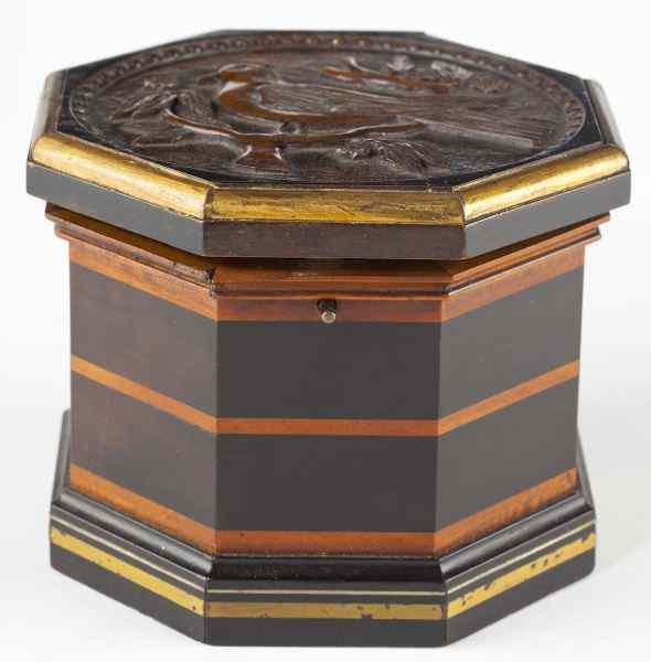 Appraisal: Victorian Carved Octagonal Tea Caddylight and dark wood veneers with