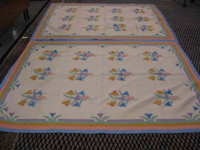 Appraisal: Pair of Antique Handmade Quilts floral with multi-border '' x