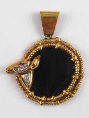 Appraisal: A yellow metal tests carat gold onyx diamond and ruby