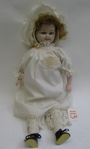 Appraisal: DOUBLE-FACED WAX-OVER GIRL DOLL in having a smiling face and