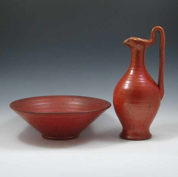 Appraisal: North State Pottery Chrome Red Bowl and Ewer bowl is