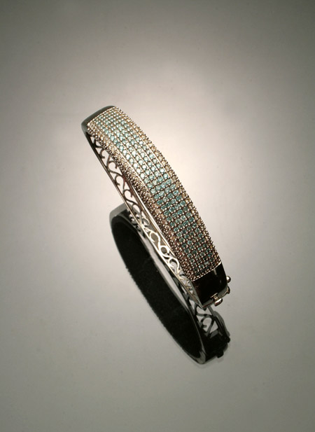 Appraisal: -Karat White-Gold White Diamond and Blue Diamond Bangle Bracelet The